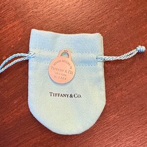 TIFFANY & CO. Please Return To TCO, .925 Sterling Round Tag Charm Only w/pouch